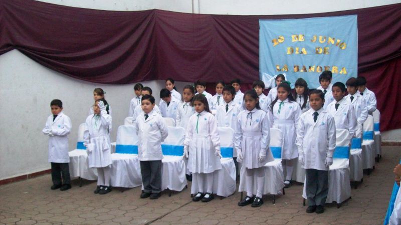 Promesa de Lealtad a la Bandera en escuelas municipales 