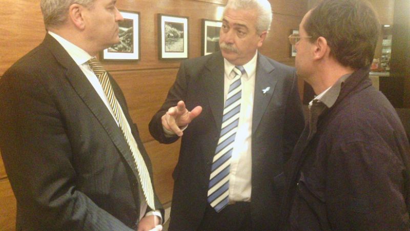 Olveira con empresarios italianos  