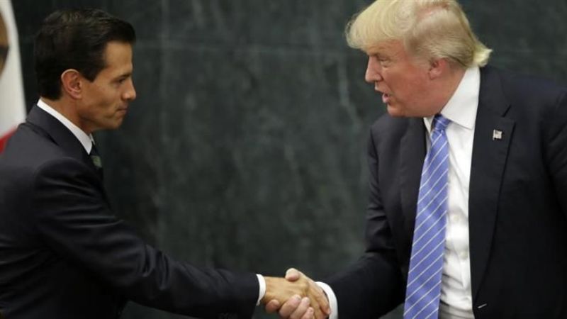 "Pacto de silencio" de Trump y Peña Nieto por el muro