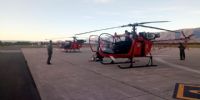 Helicópteros en el aeropuerto Felipe Varela, por regresar a Buenos Aires, a bordo del Hércules.
