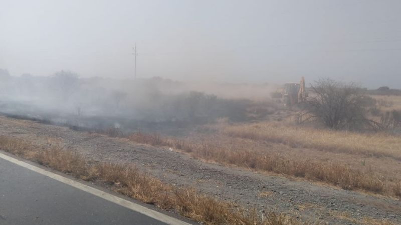 Visibilidad reducida por un incendio entre Huillapima y Miraflores