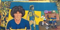 UNO DE LOS TANTOS murales en la Boca, donde vivió gran parte de su gloria.