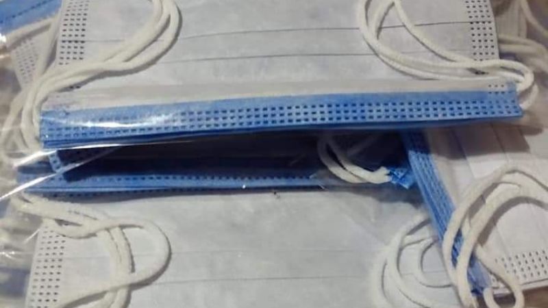 Entrega de barbijos en los barrios de la capital