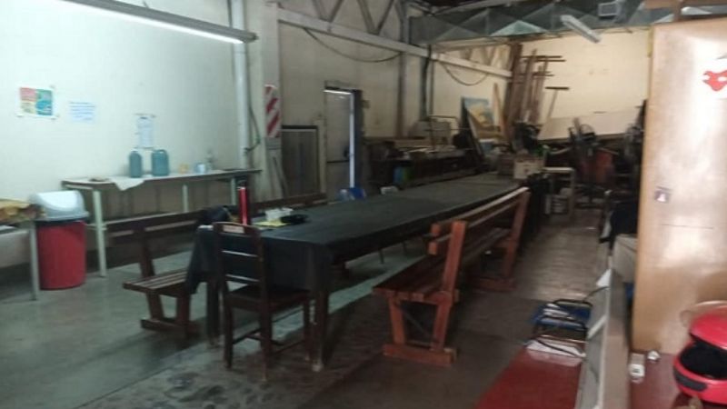 Trabajadores de la Fábrica de Alfombras con quite de colaboración