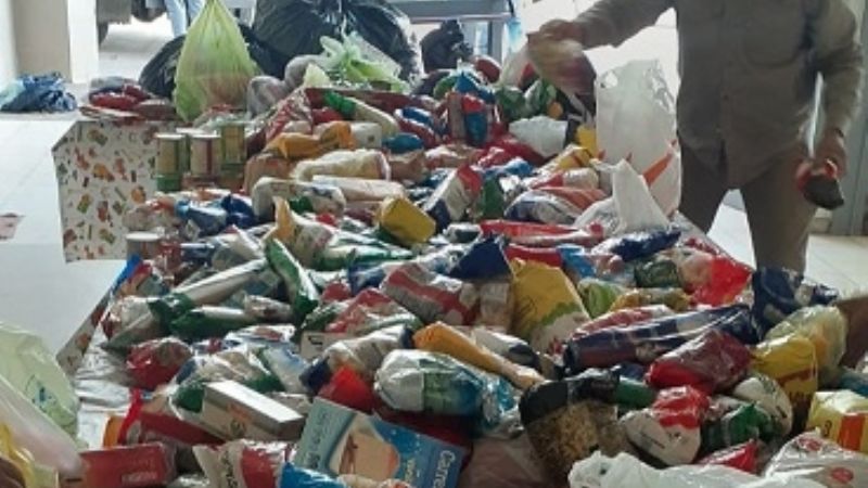 Entregan alimentos donados en presentación de buzos