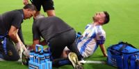 MESSI cuando fue atendido en el partido de la final, ante Uruguay, cuando debió dejar el campo de juego.